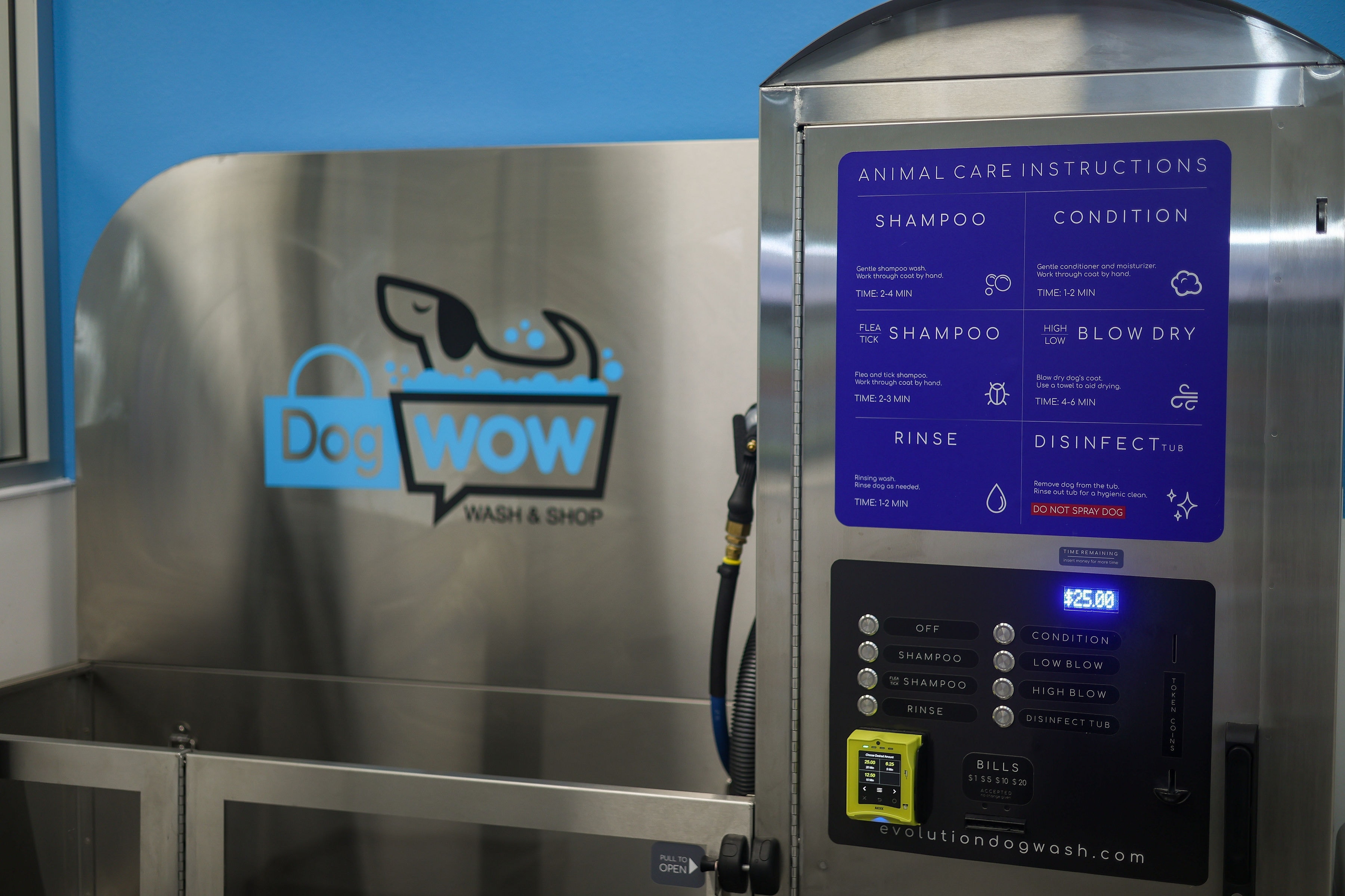 DOGWOW self-serve wash station control panel with animal care instructions